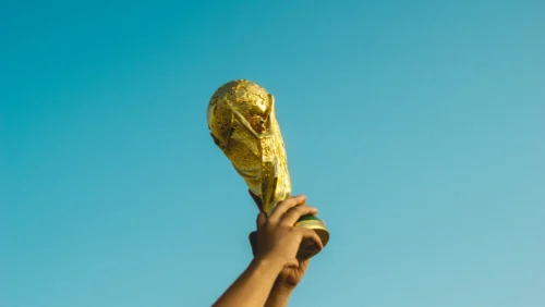 Player lifting the World Cup trophy