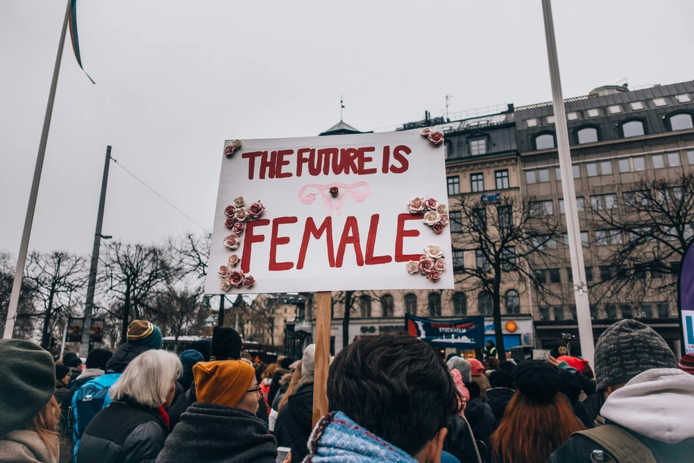 A sign saying 'The Future is Female' at a march