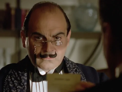 David Suchet as Detective Hercule Poirot