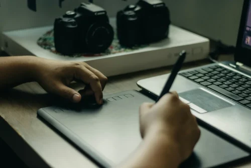 A person using an art tablet