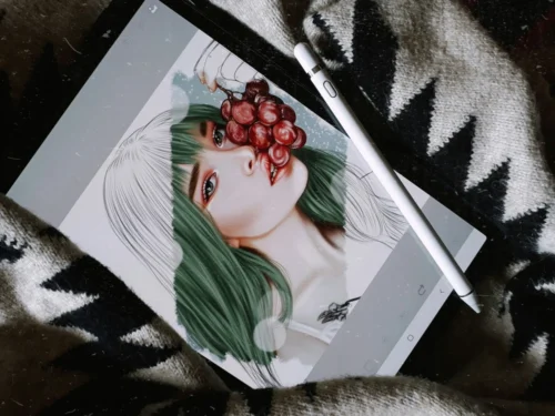A drawing of a woman on an art tablet