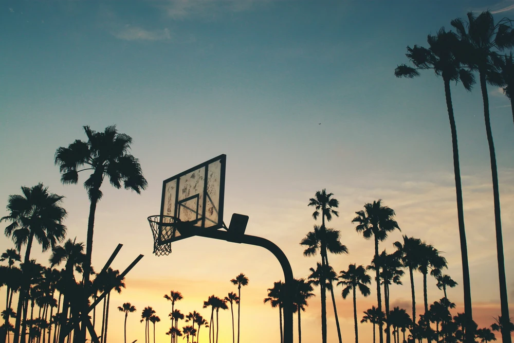 Basketball basket at sunset