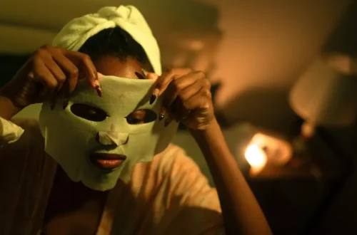 Person applying sheet mask
