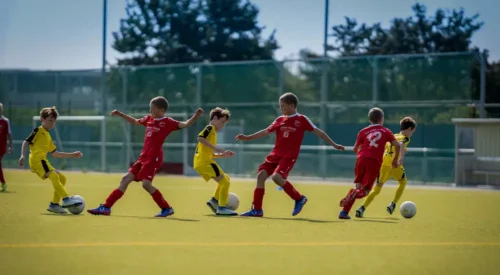 Kids playing football